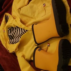 Kids yellow raincoat and matching boots
